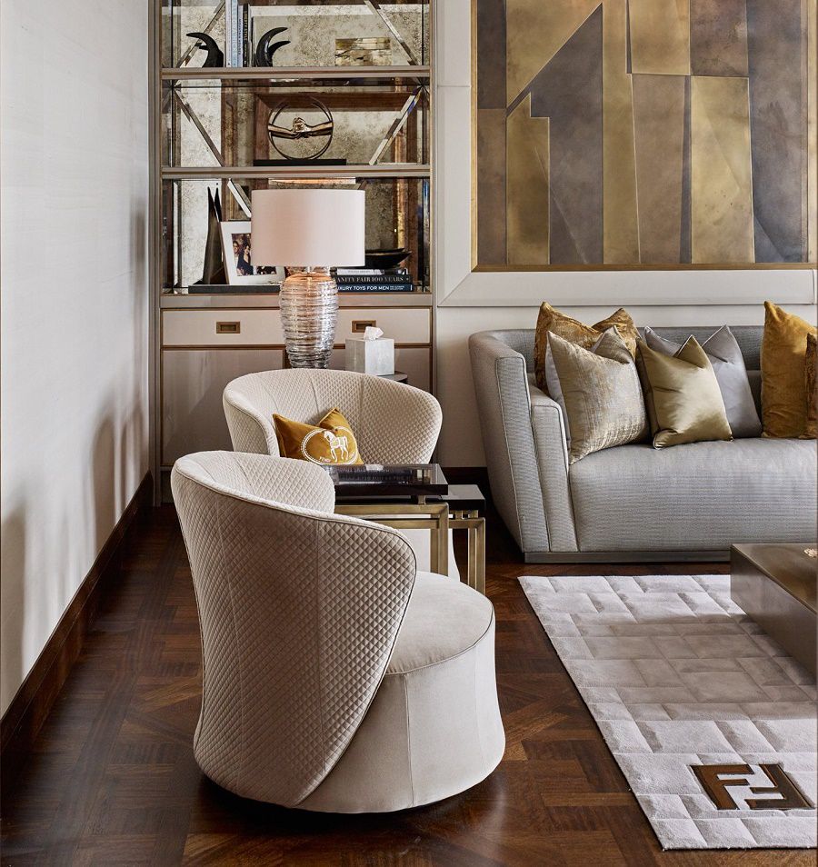 A modern luxury living room with a black sofa, paired with a dark